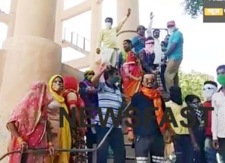 People angry over shortage of drinking water, climbed over overhead tank