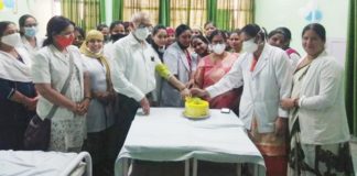 Women nurses celebrated International Women's Day by cutting a cake