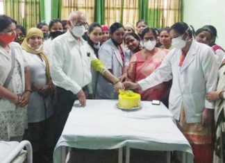 Women nurses celebrated International Women's Day by cutting a cake