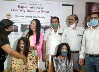 Distribution of hair wigs to poor children suffering from cancer